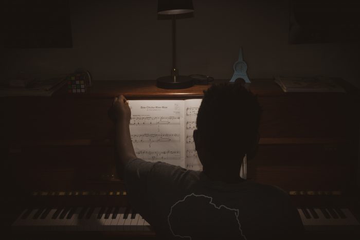 sheet music in dark room