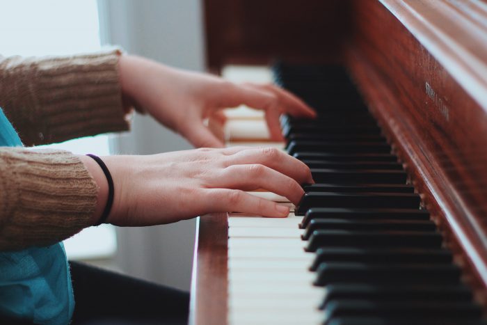 young woman at piano