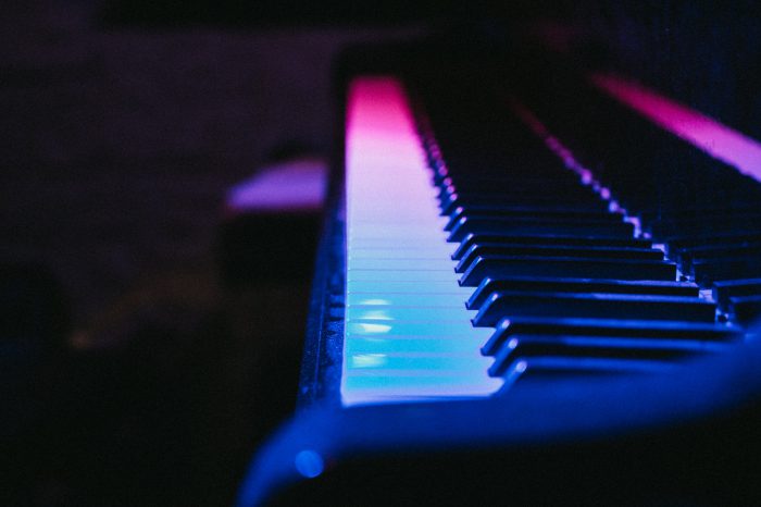 piano with pink and blue lights